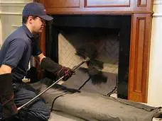 Chimney Sweep Cleveland Ohio Expert Performing Fireplace Cleaning Services for Fireplace Cleaning and Inspection Near Me